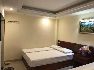 King Room with Garden View — Camellia Guest House
